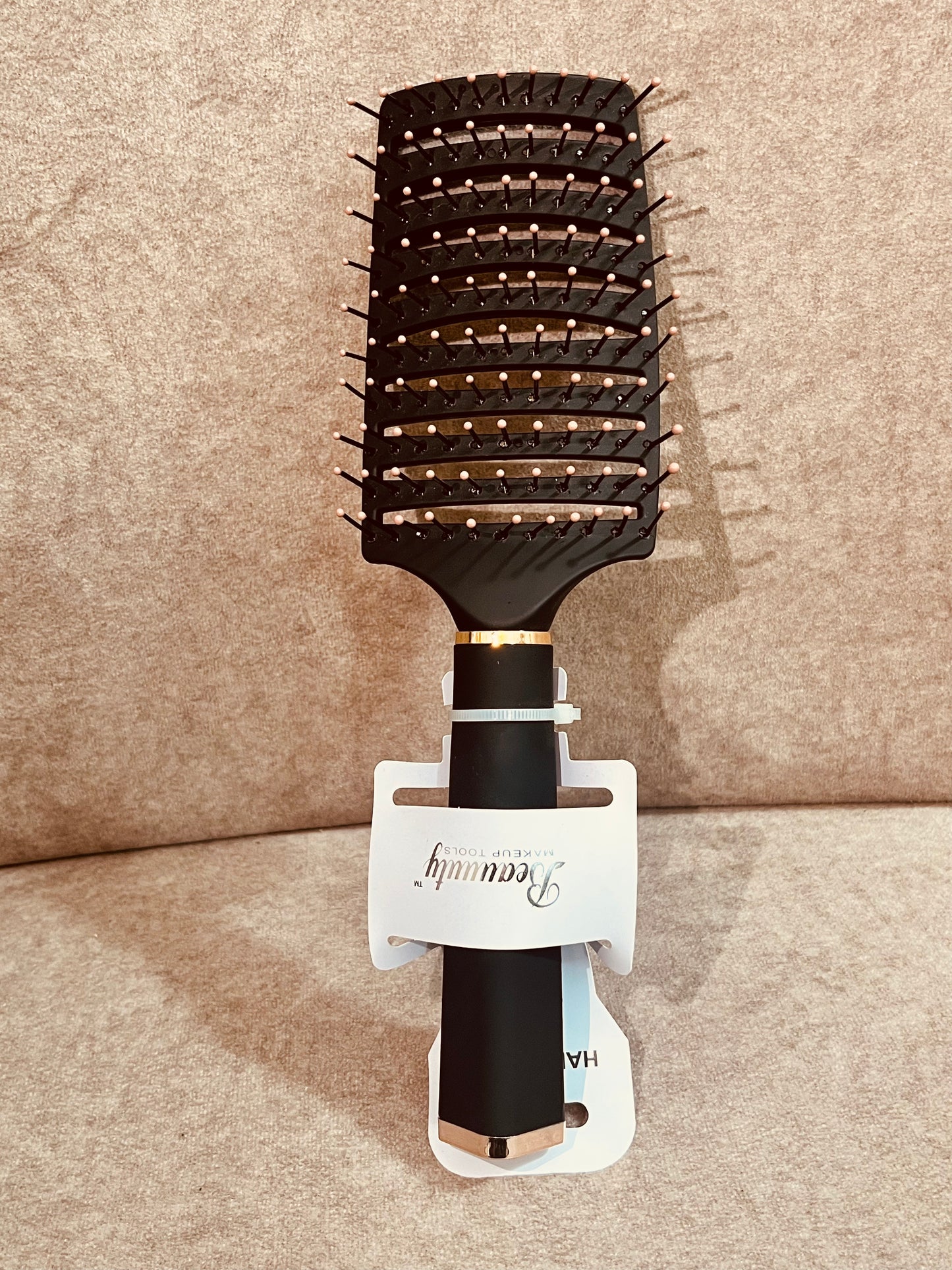 Brosse démêlant cheveux et mèche